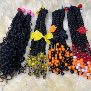 Kids ponytail wrap on braids with beads selling a piece for $30
